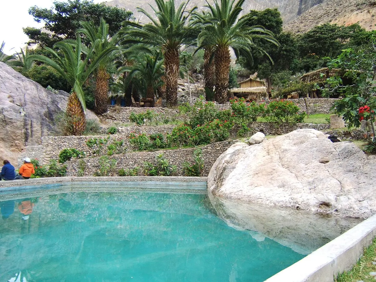 Pool among palm trees at Paraiso Lodge in Sangalle, photographed in 2007